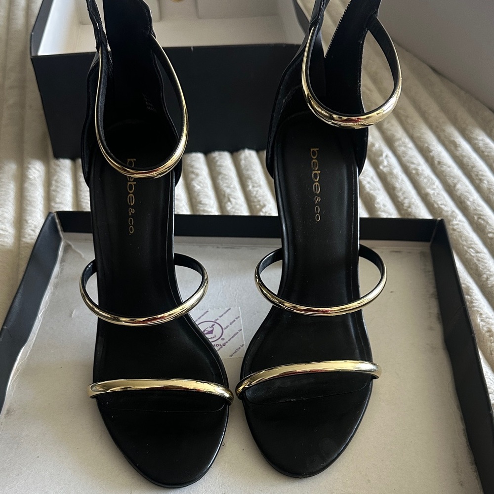 Bebe Black and Gold Women's Sandals